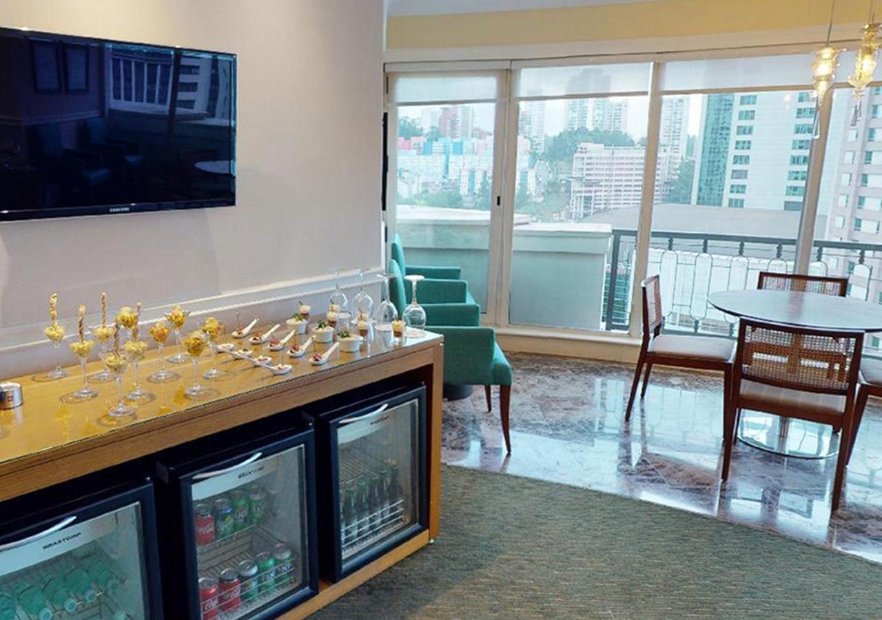 ホテル グラン エスタンプラザ ベリーニ サンパウロ エクステリア 写真 The lounge at the airport.