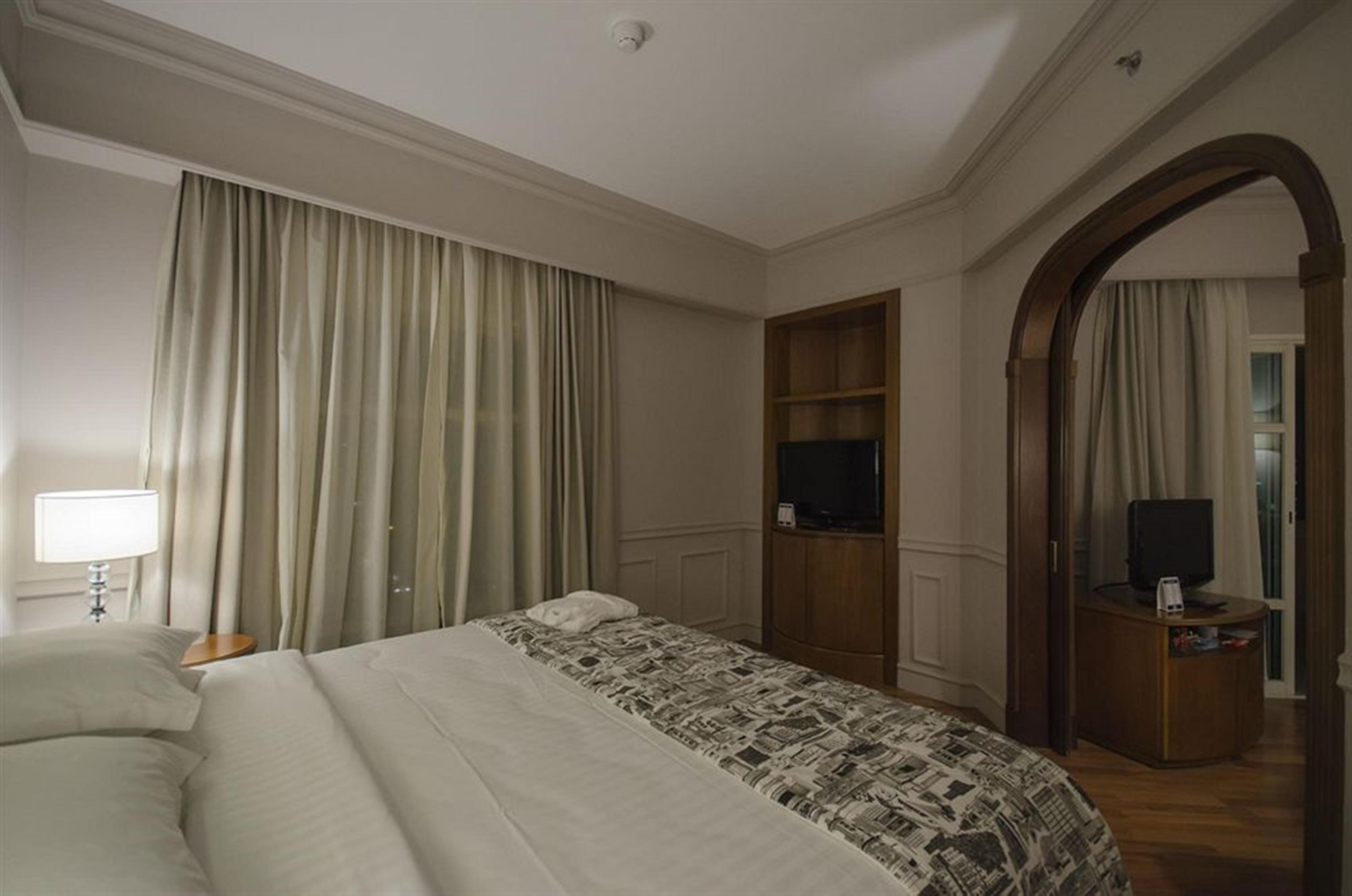 ホテル グラン エスタンプラザ ベリーニ サンパウロ エクステリア 写真 A bedroom at the hotel